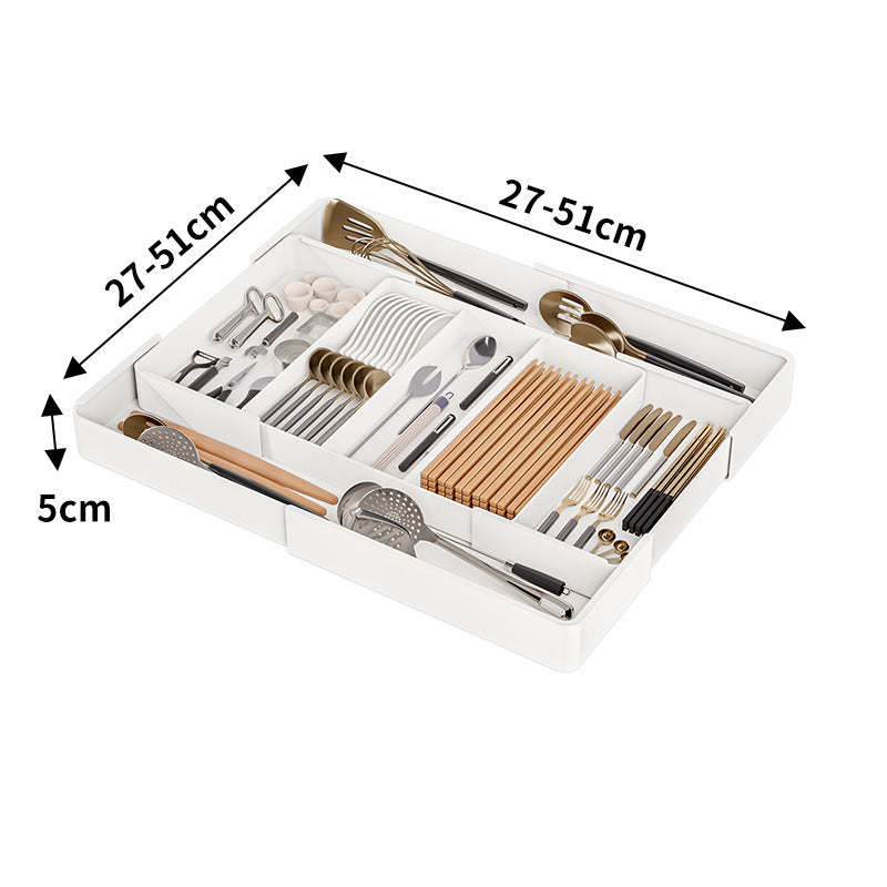 Aanpasbare lade-organizer van robuust plastic, ideaal voor keukengerei, flexibele breedte, eenvoudig te reinigen.