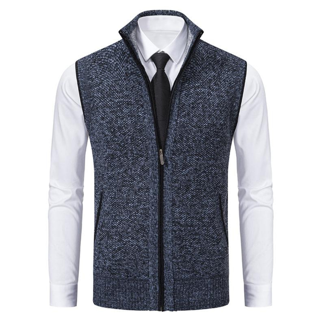 Mouwloos gebreid herenvest in blauw, grijs, rood en zwart, met rits, minimalistisch design, veelzijdig te dragen.