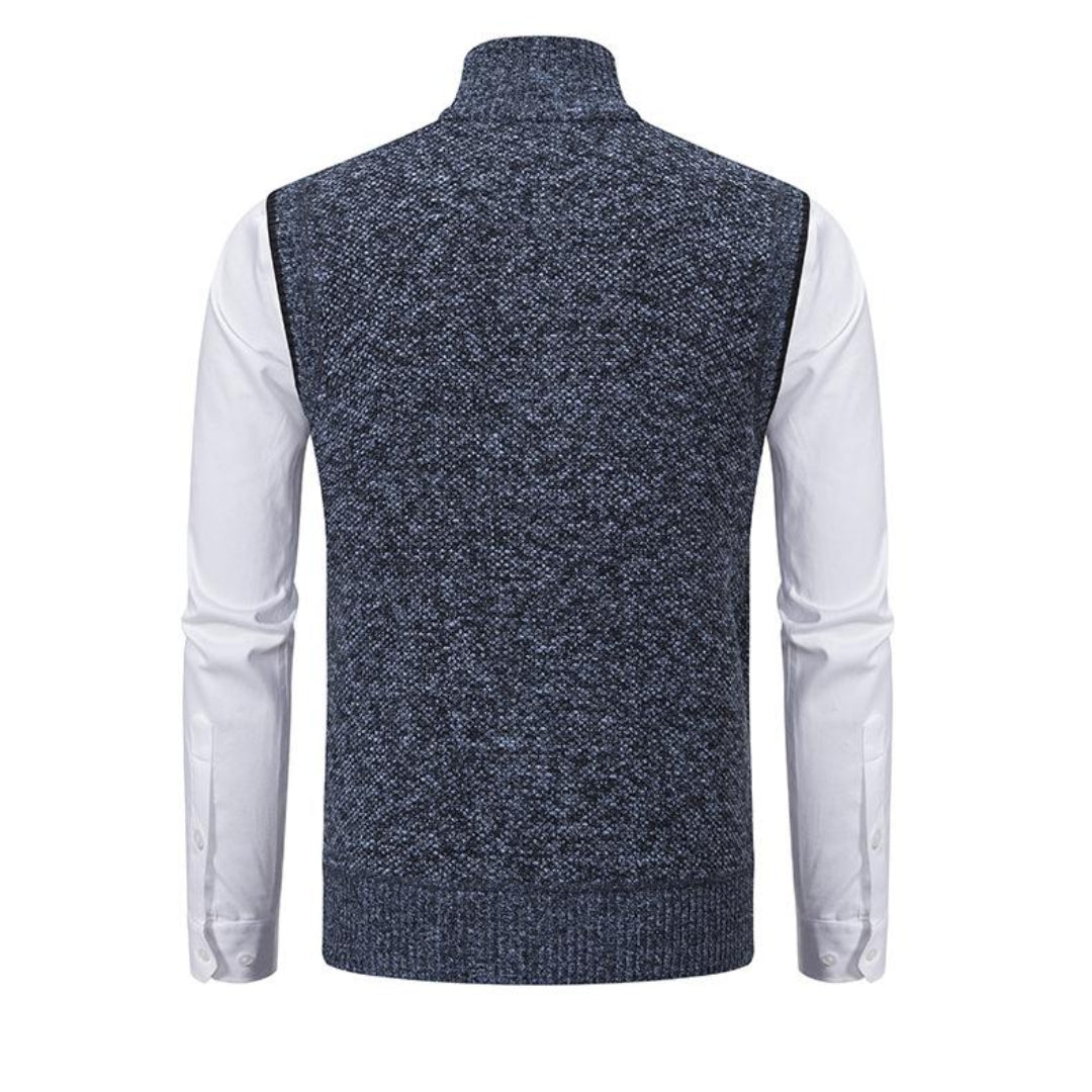 Mouwloos gebreid herenvest in blauw, grijs, rood en zwart, met rits, minimalistisch design, veelzijdig te dragen.