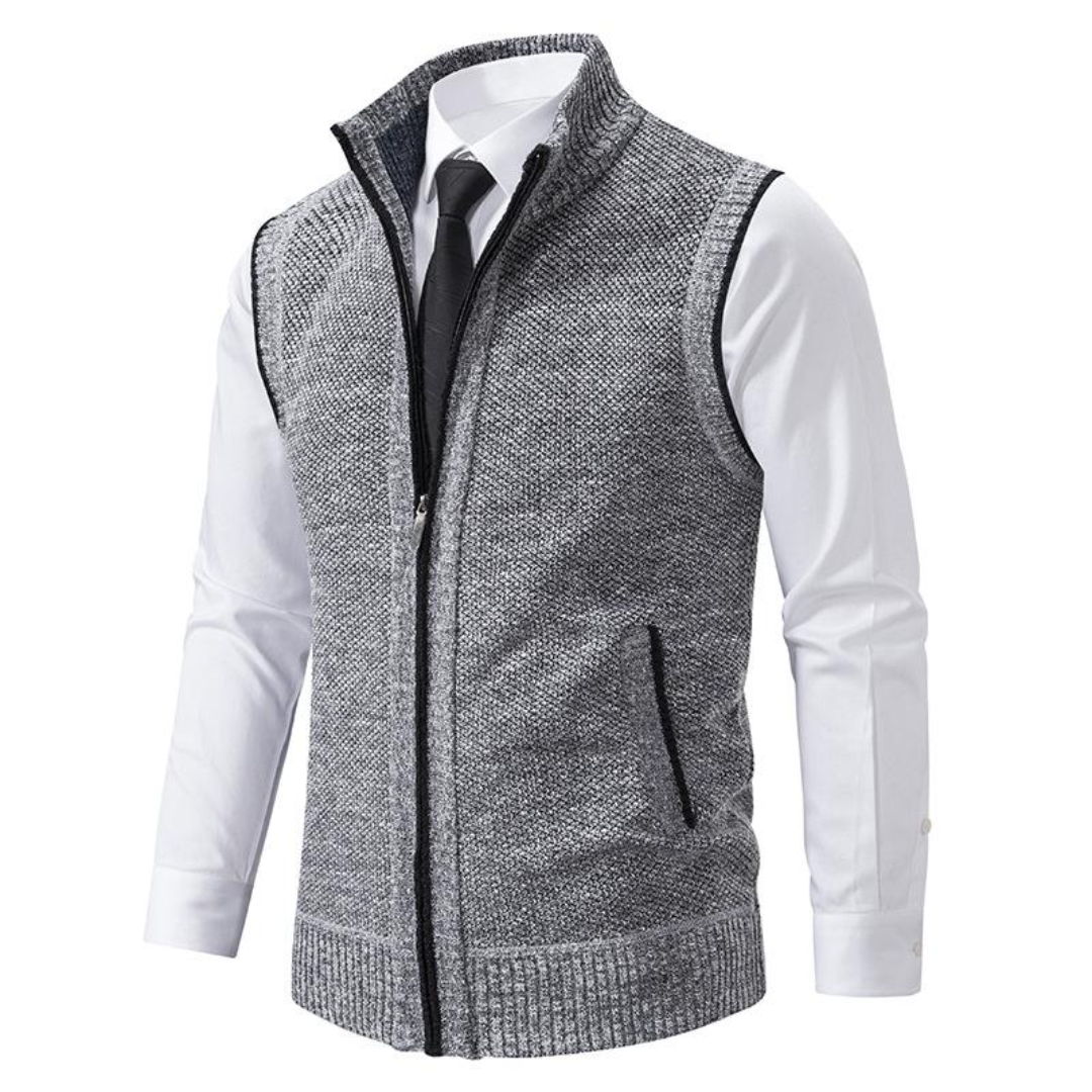 Mouwloos gebreid herenvest in blauw, grijs, rood en zwart, met rits, minimalistisch design, veelzijdig te dragen.