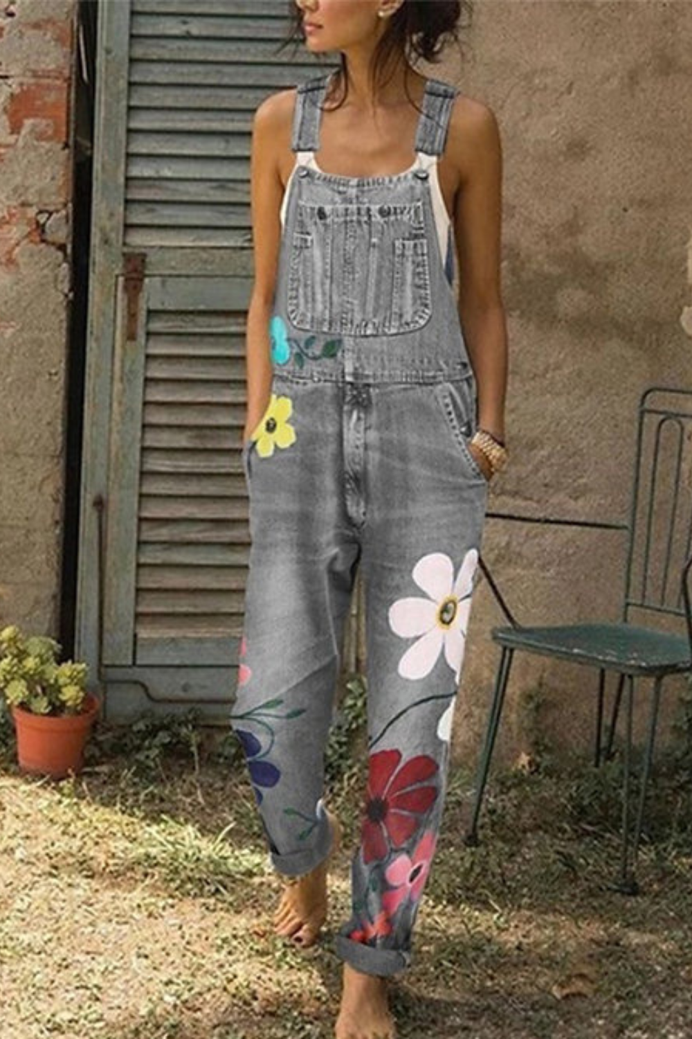 Mouwloze denim jumpsuit voor dames met bloemenprint, comfortabele pasvorm, perfect voor dagelijks gebruik.