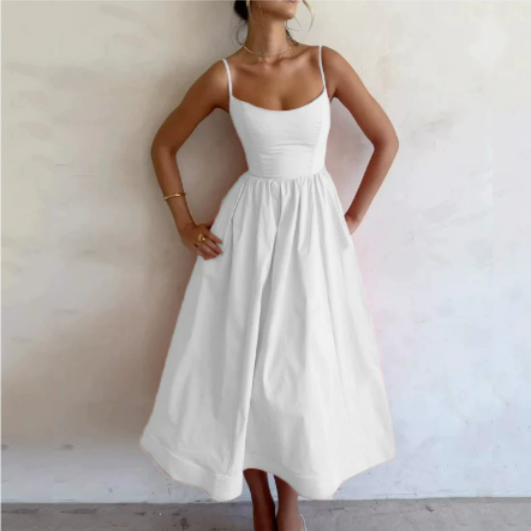 Stijlvolle damesjurk voor de zomer, A-lijn model, mouwloos, luchtige stof, veelzijdig en elegant.