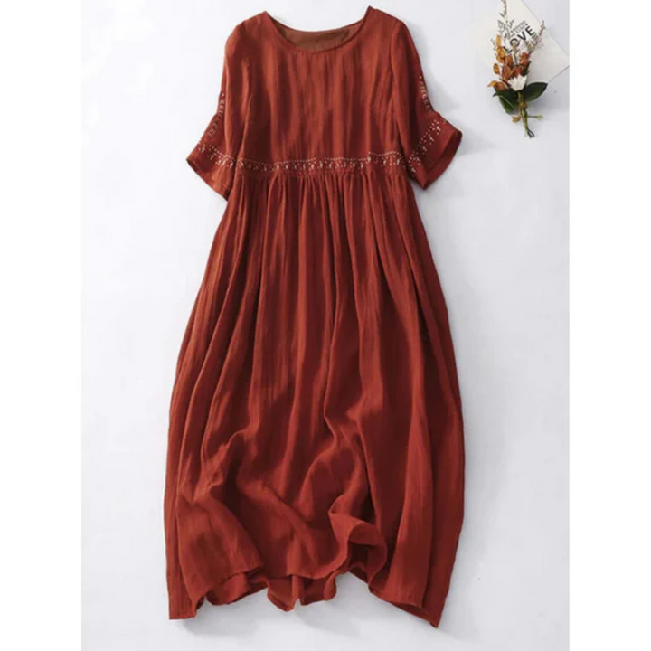 Dames mouwloze midi-avondjurk in een zwierig ontwerp, flatterend silhouet, ideaal voor formele gelegenheden.