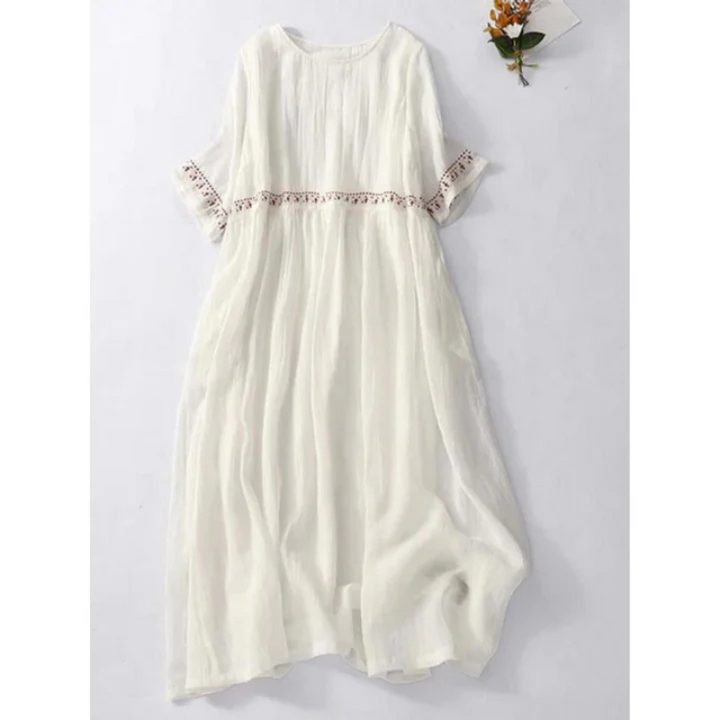 Dames mouwloze midi-avondjurk in een zwierig ontwerp, flatterend silhouet, ideaal voor formele gelegenheden.