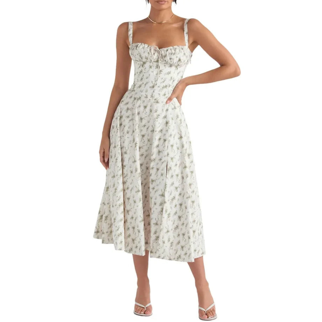 Mouwloze zomerjurk met sweetheart halslijn, elegante midi-snit en getailleerd design voor een vrouwelijk silhouet.