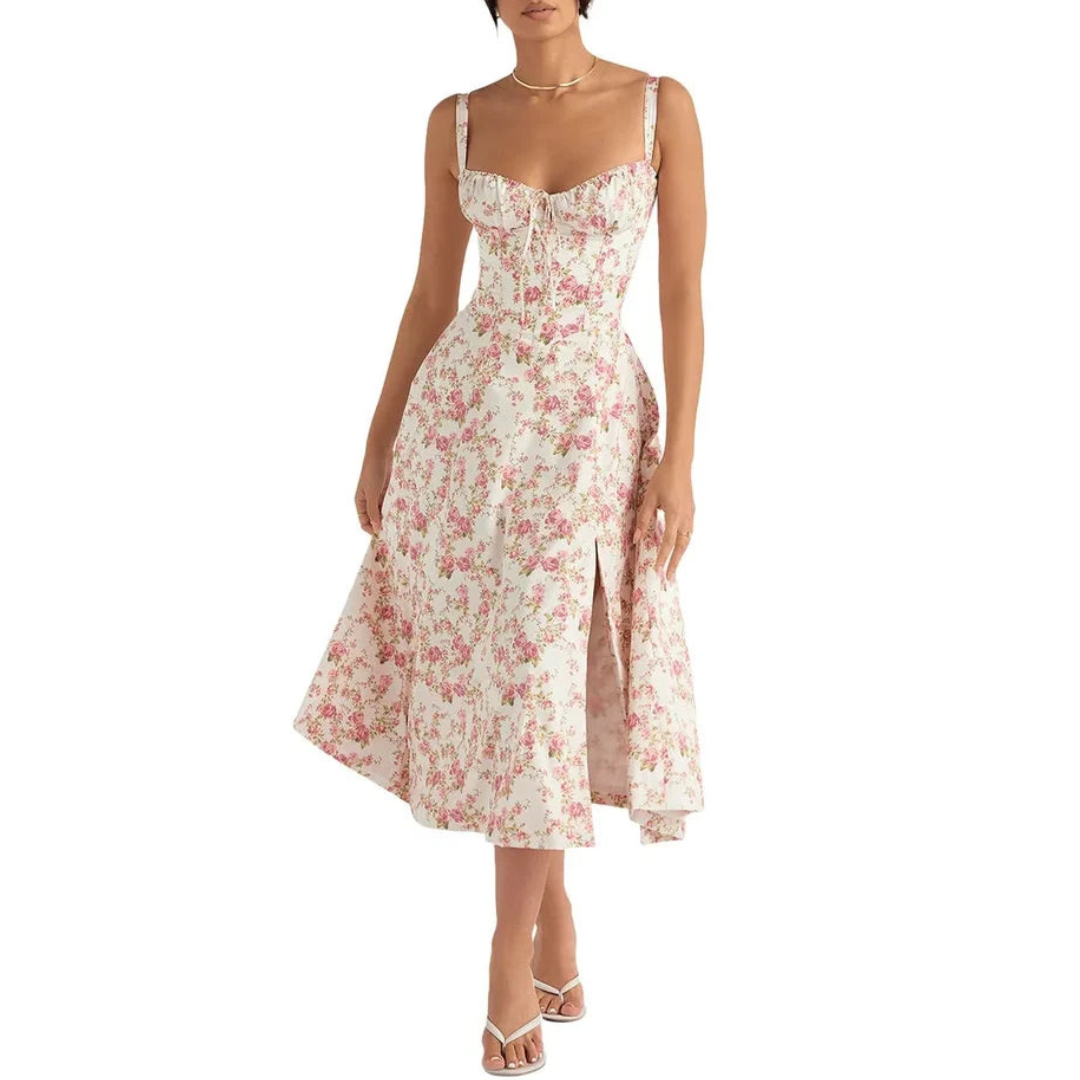 Mouwloze zomerjurk met sweetheart halslijn, elegante midi-snit en getailleerd design voor een vrouwelijk silhouet.