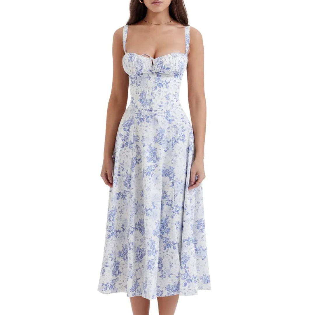 Mouwloze zomerjurk met sweetheart halslijn, elegante midi-snit en getailleerd design voor een vrouwelijk silhouet.