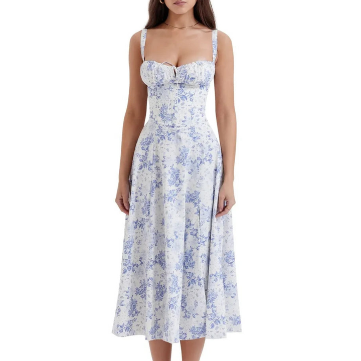 Mouwloze zomerjurk met sweetheart halslijn, elegante midi-snit en getailleerd design voor een vrouwelijk silhouet.