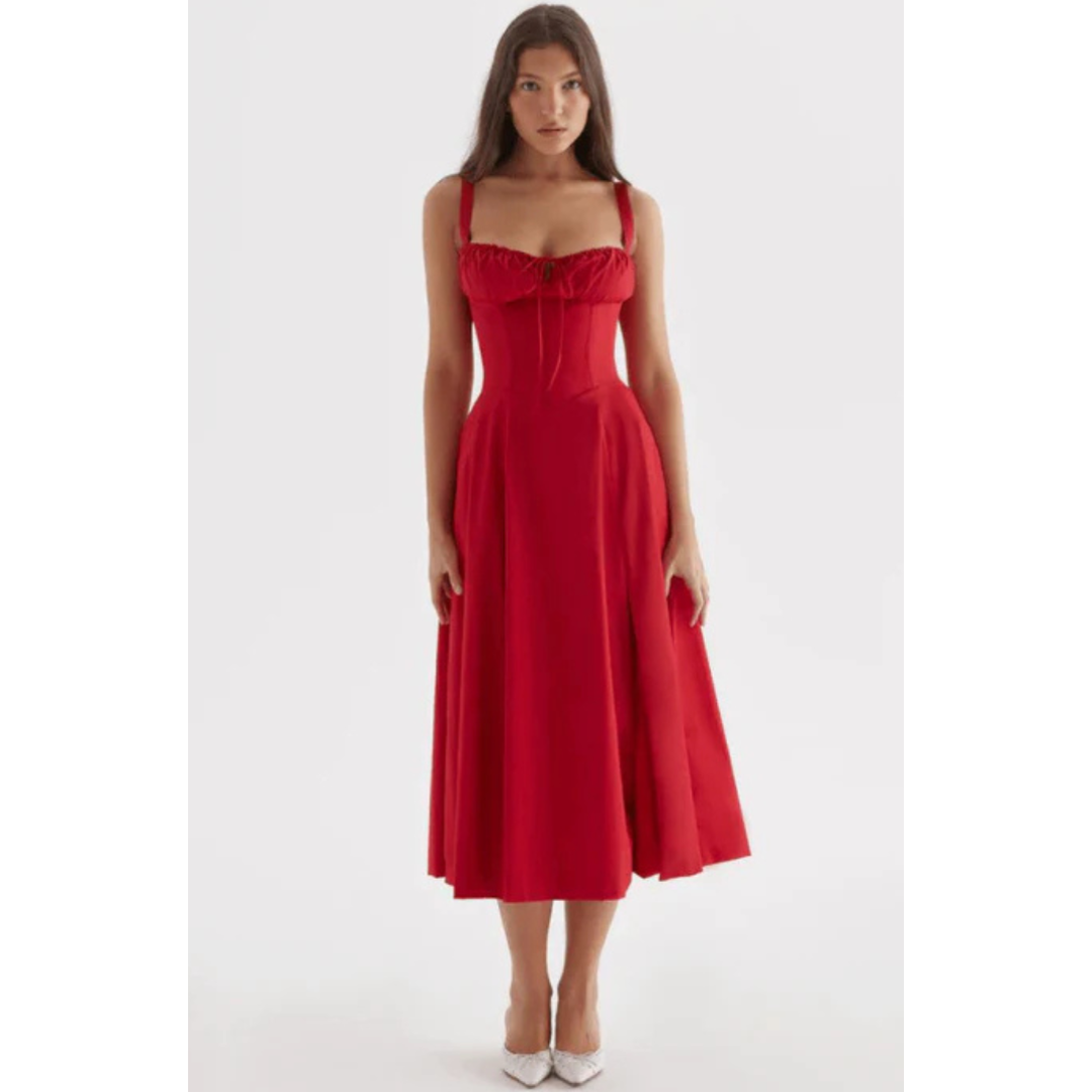 Mouwloze zomerjurk met sweetheart halslijn, elegante midi-snit en getailleerd design voor een vrouwelijk silhouet.