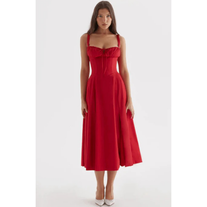 Mouwloze zomerjurk met sweetheart halslijn, elegante midi-snit en getailleerd design voor een vrouwelijk silhouet.