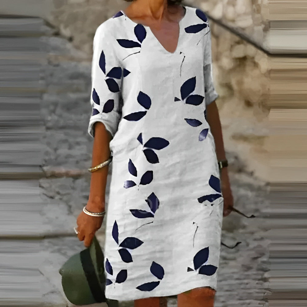 Adembenemende zomerjurk voor dames met blaadjesprint, elegant en licht, perfect voor stijlvolle zomerse gelegenheden.