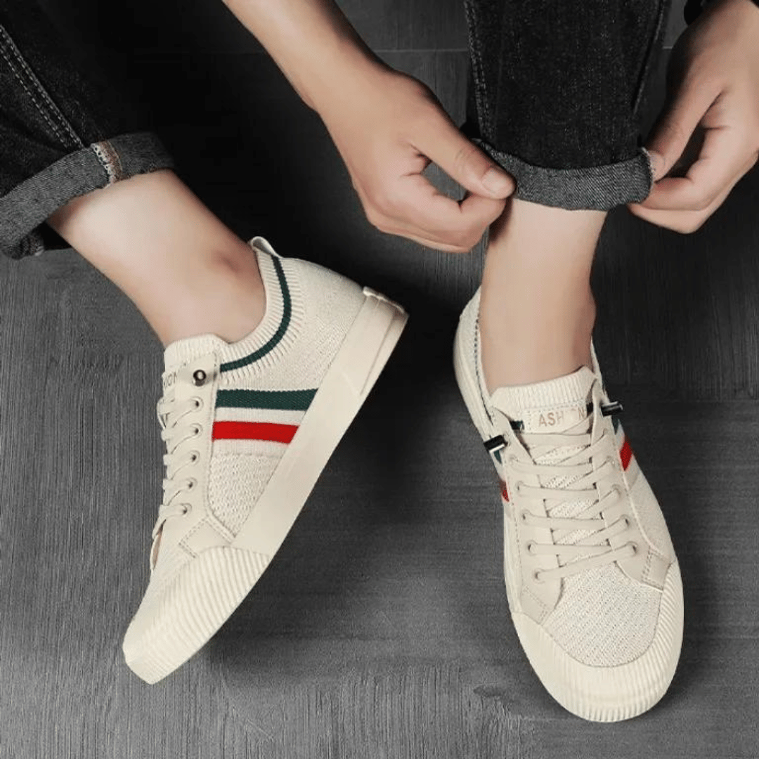 Ademende herensneakers van mesh, in beige en zwart design, met een ergonomische zool voor comfort en stijlvolle gelegenheden.