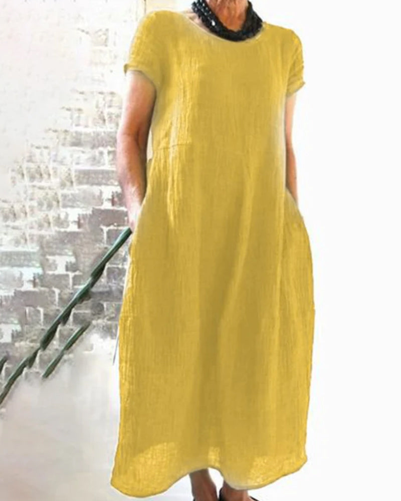 Comfortabele dames midijurk met korte mouwen, ronde hals, veelzijdige stijl, verkrijgbaar in diverse kleuren.