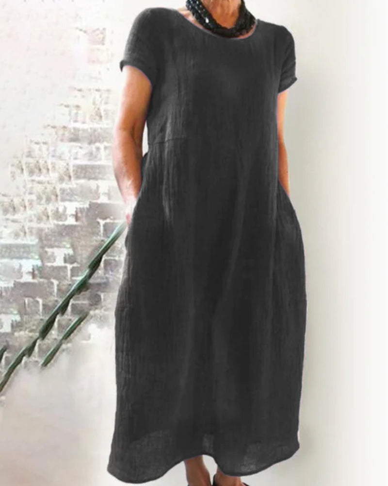 Comfortabele dames midijurk met korte mouwen, ronde hals, veelzijdige stijl, verkrijgbaar in diverse kleuren.