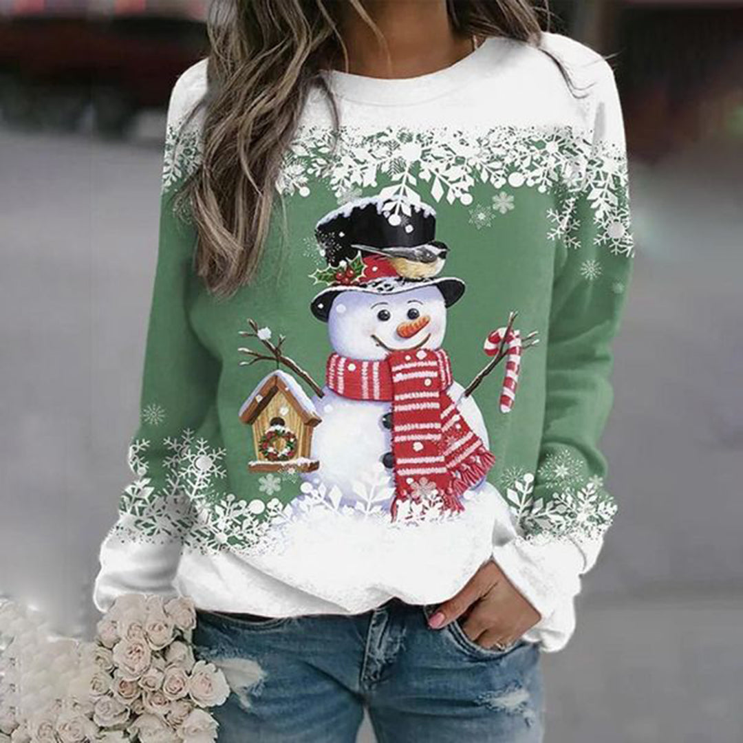 Blauwe dames kersttrui in comfortabele pasvorm, zacht materiaal, ideaal voor koude winterdagen en feestelijke styling.