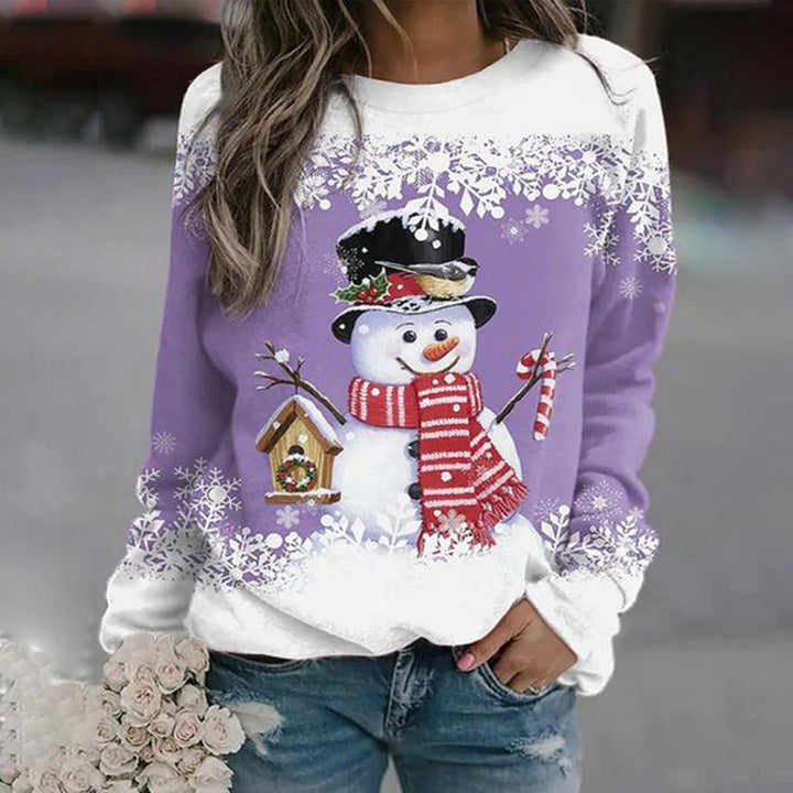 Blauwe dames kersttrui in comfortabele pasvorm, zacht materiaal, ideaal voor koude winterdagen en feestelijke styling.