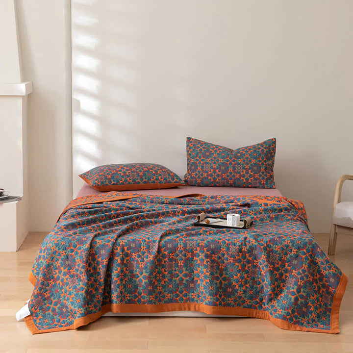 Blauwe quilt met zes katoenlagen en artistiek patroon voor stijlvolle woninginrichting en aangename warmte.