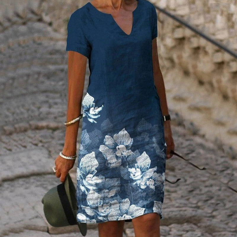 Midi jurk dames met bloemenprint en V-hals, elegant en comfortabel, ideaal voor zomer en tuinfeesten