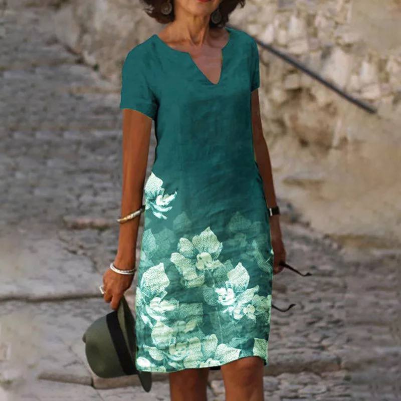 Midi jurk dames met bloemenprint en V-hals, elegant en comfortabel, ideaal voor zomer en tuinfeesten