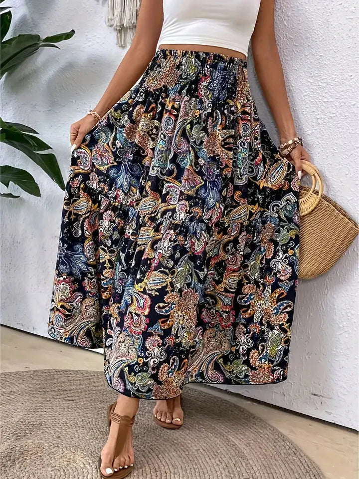 Boho Maxi-rok voor dames, vloeiend met patroon en verfijnde taille, voor elegante looks in Zwart, Rood of Bruin.