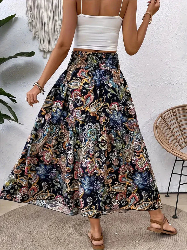 Boho Maxi-rok voor dames, vloeiend met patroon en verfijnde taille, voor elegante looks in Zwart, Rood of Bruin.