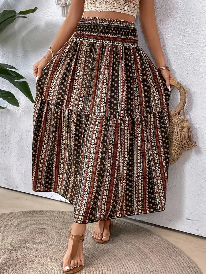 Boho Maxi-rok voor dames, vloeiend met patroon en verfijnde taille, voor elegante looks in Zwart, Rood of Bruin.