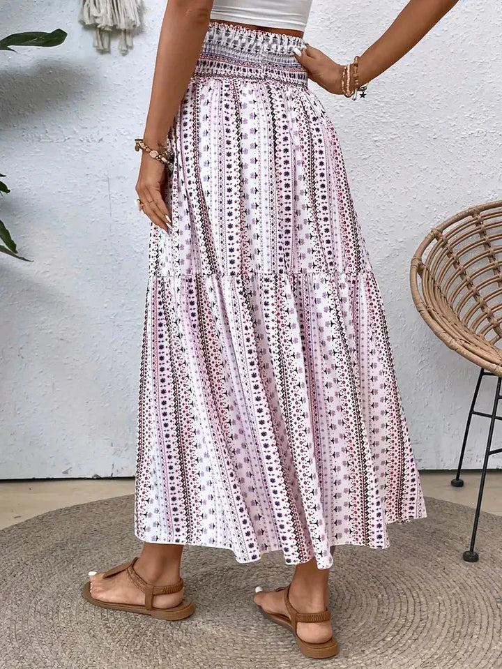 Boho Maxi-rok voor dames, vloeiend met patroon en verfijnde taille, voor elegante looks in Zwart, Rood of Bruin.