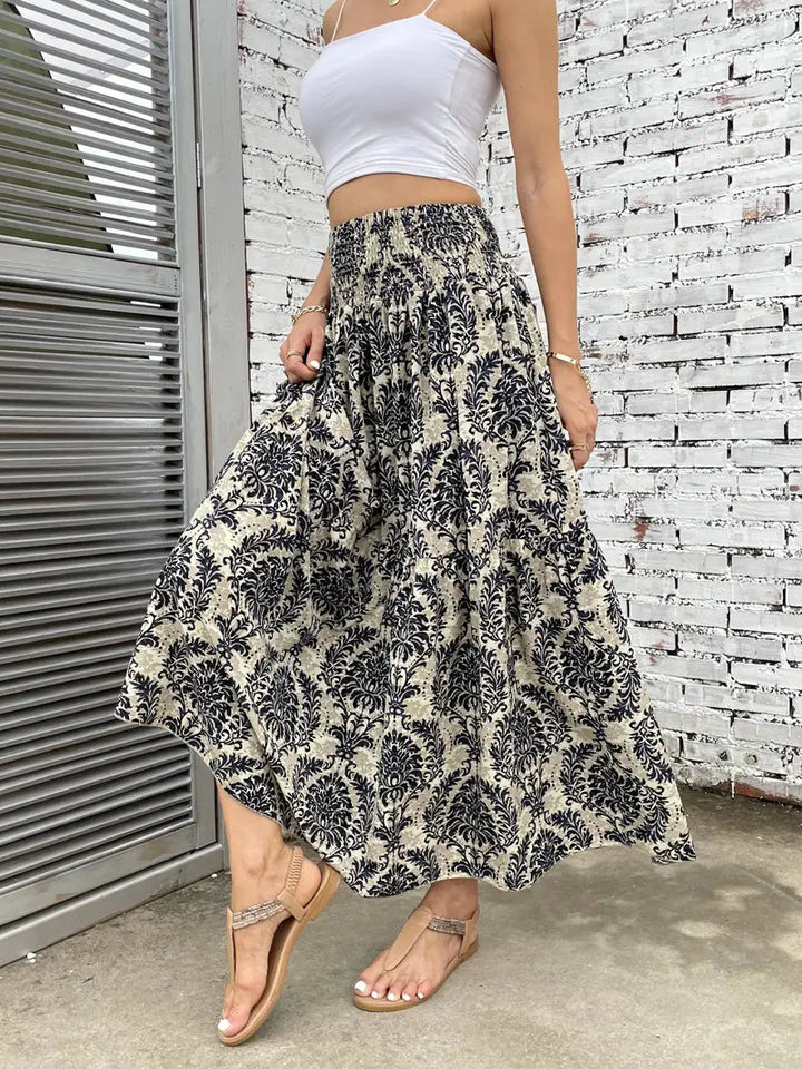 Boho Maxi-rok voor dames, vloeiend met patroon en verfijnde taille, voor elegante looks in Zwart, Rood of Bruin.