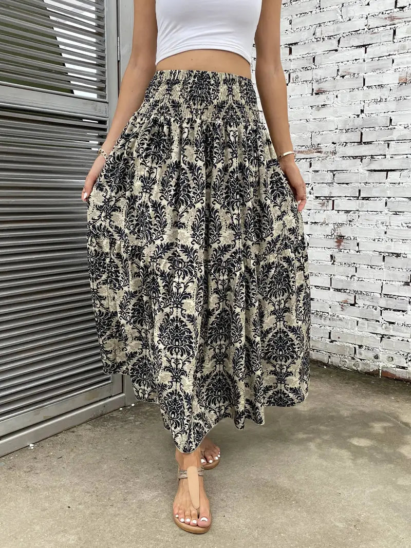 Boho Maxi-rok voor dames, vloeiend met patroon en verfijnde taille, voor elegante looks in Zwart, Rood of Bruin.