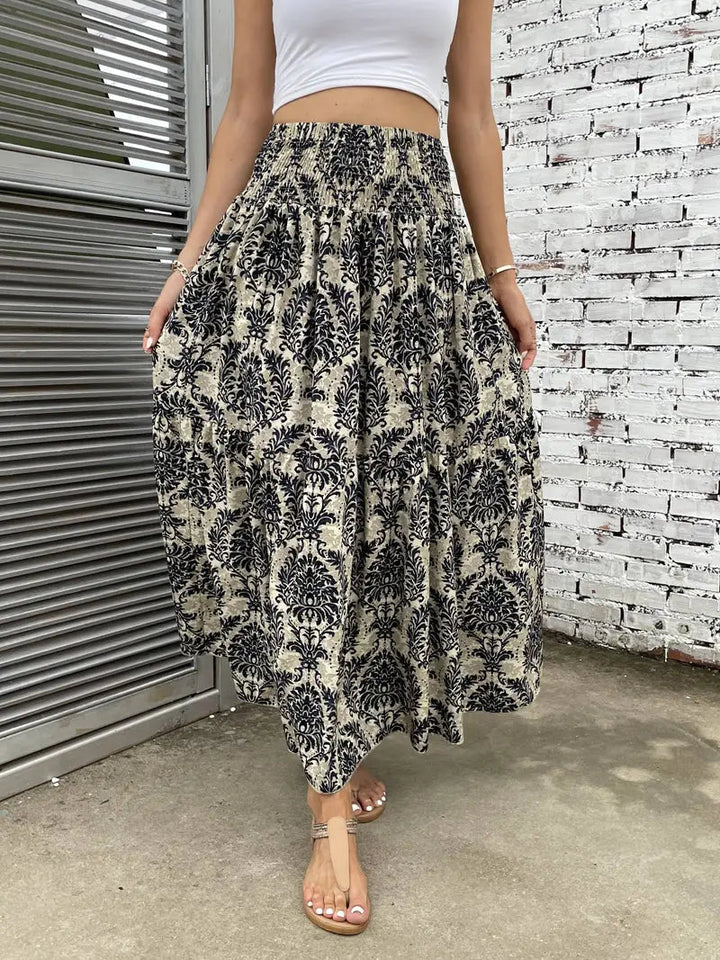 Boho Maxi-rok voor dames, vloeiend met patroon en verfijnde taille, voor elegante looks in Zwart, Rood of Bruin.
