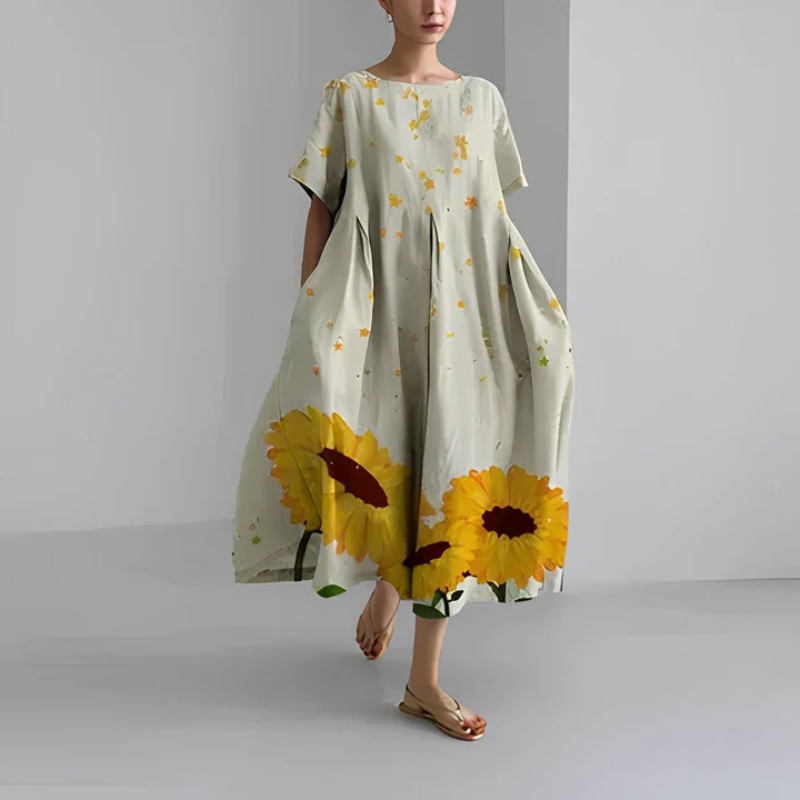 Boho midi jurk voor dames met delicate bloemenprint, vloeiende pasvorm en veelzijdige stijl, perfect voor elke gelegenheid.