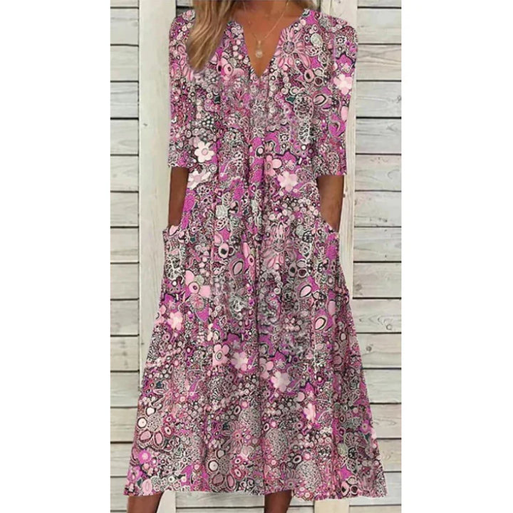 Dames boho linnen zomerjurk met elegant bloemenpatroon, V-hals en korte mouwen, ideaal voor warme dagen.