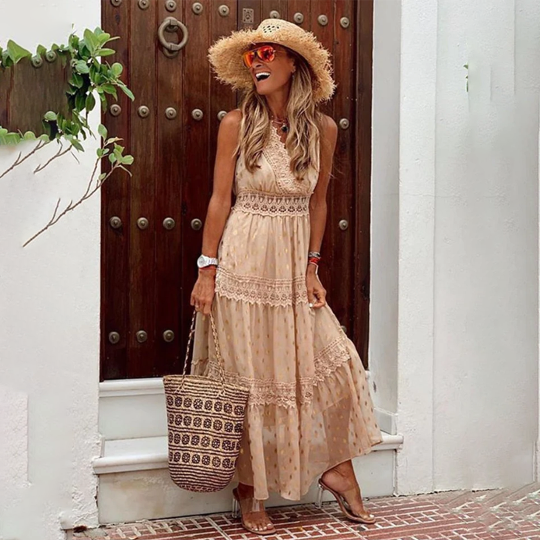 Blauwe dames Boho zomerjurk, losvallend met fijn bewerkte details, ideaal voor stijlvolle zomerdagen.