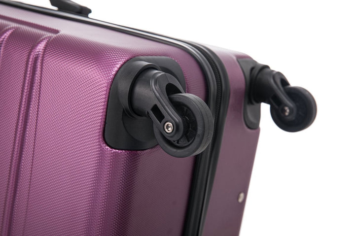 Sterke bordeaux hardshell koffers, optimale bescherming voor uw bagage tijdens reizen.