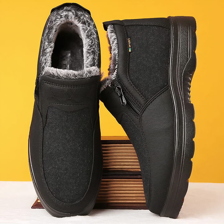 Zwarte Arctic Pro orthopedische winterlaarzen voor mannen, warm, comfortabel en ideaal voor steunzolen.
