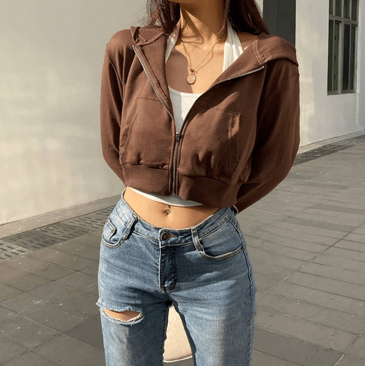 Trendy roze dames cropped zip-up hoodie met capuchon, comfortabele sportieve kleding.