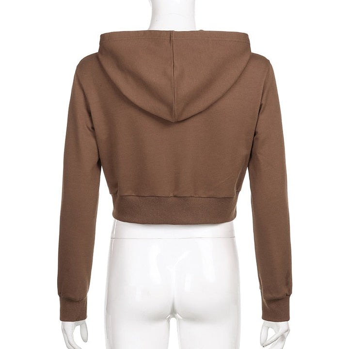 Sportieve roze dames cropped hoodie met rits, capuchon en trendy design voor dagelijks gebruik.