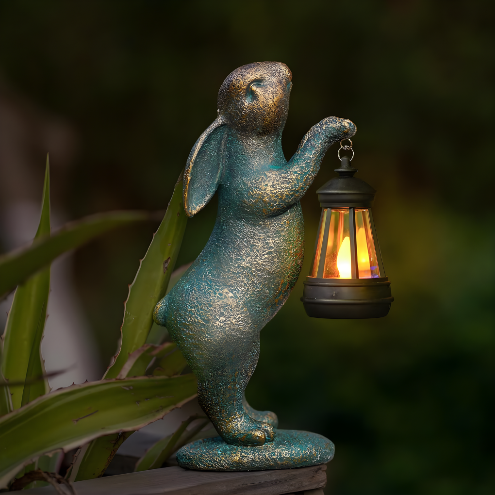 Charmant konijn tuinbeeld voor speelse tuindecoratie. Dit betoverende dierfiguur verfraait elke tuin of terras.