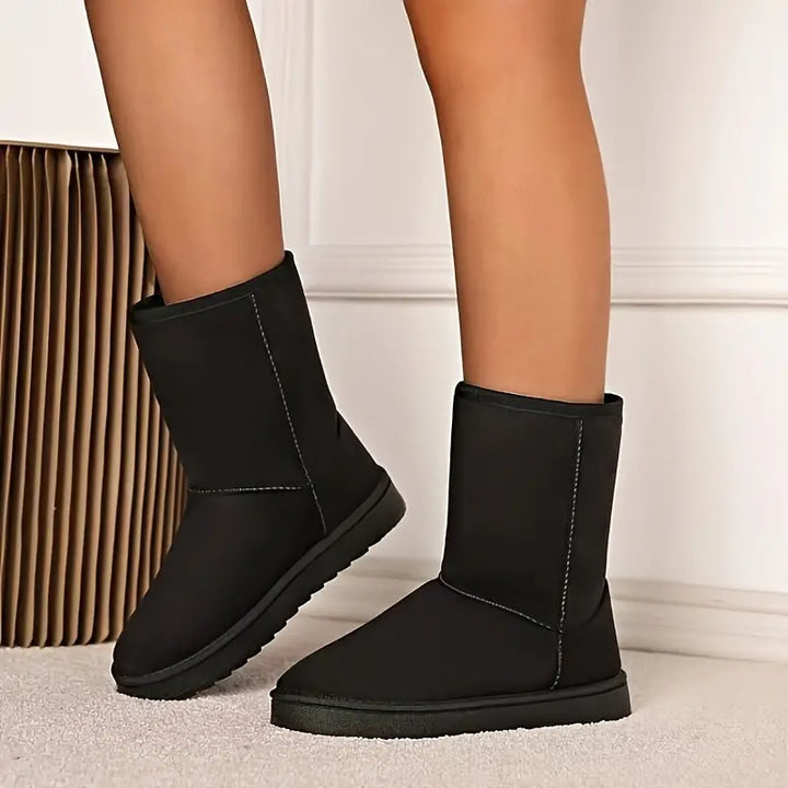 Comfortabele Aria dames slip-on winterlaarzen met warme fleecevoering. Perfect voor stijl en warmte.