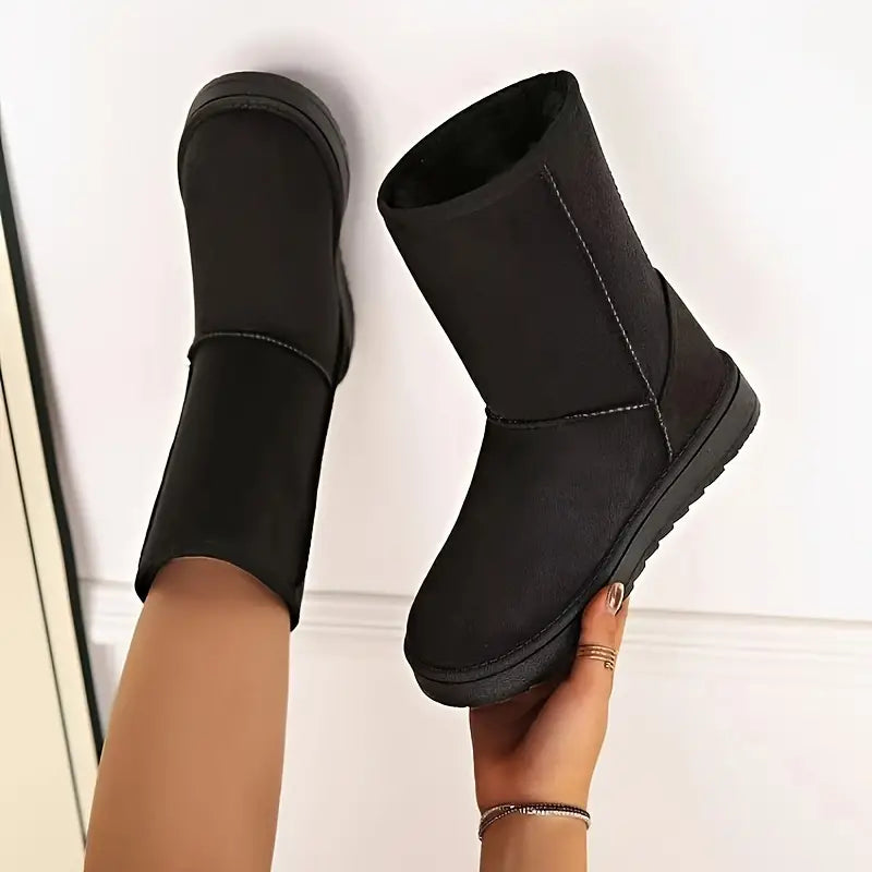 Stijlvolle bruine Aria dames winterlaarzen. Waterbestendig, antislip en warm voor ultiem wintercomfort.