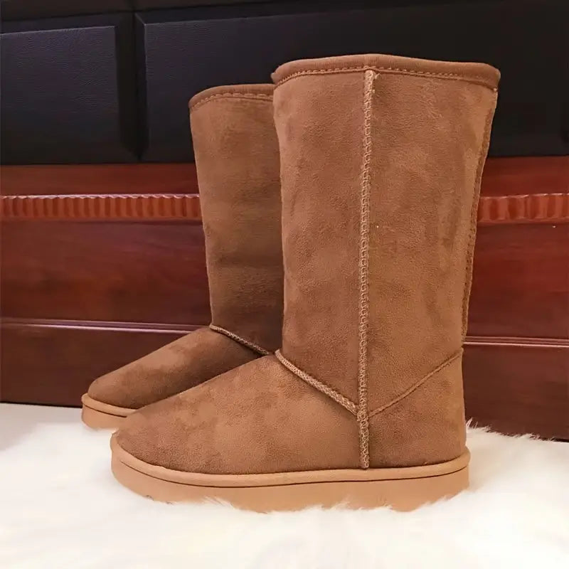Duurzame Aria dames sneeuwlaarzen. Waterbestendig, antislip zool en warme voering voor winterse omstandigheden.