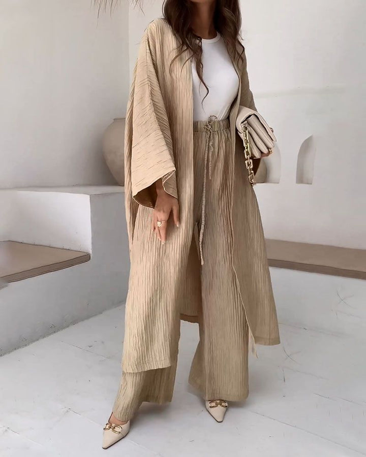 Stijlvolle khaki tweedelige dames set: casual vest en bijpassende broek voor een ontspannen look.