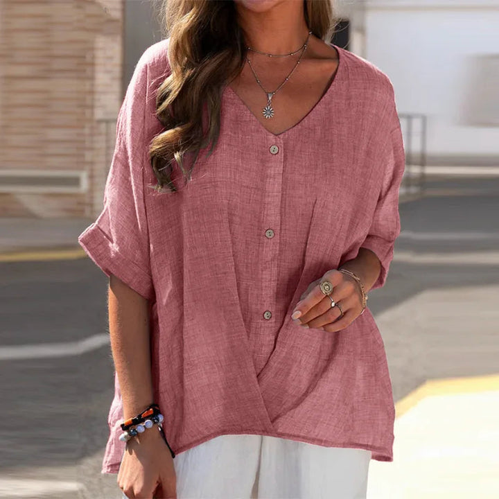 Moderne damesblouse met knopen, V-hals en relaxte pasvorm, de perfecte 3/4 mouw top voor dagelijkse mode.