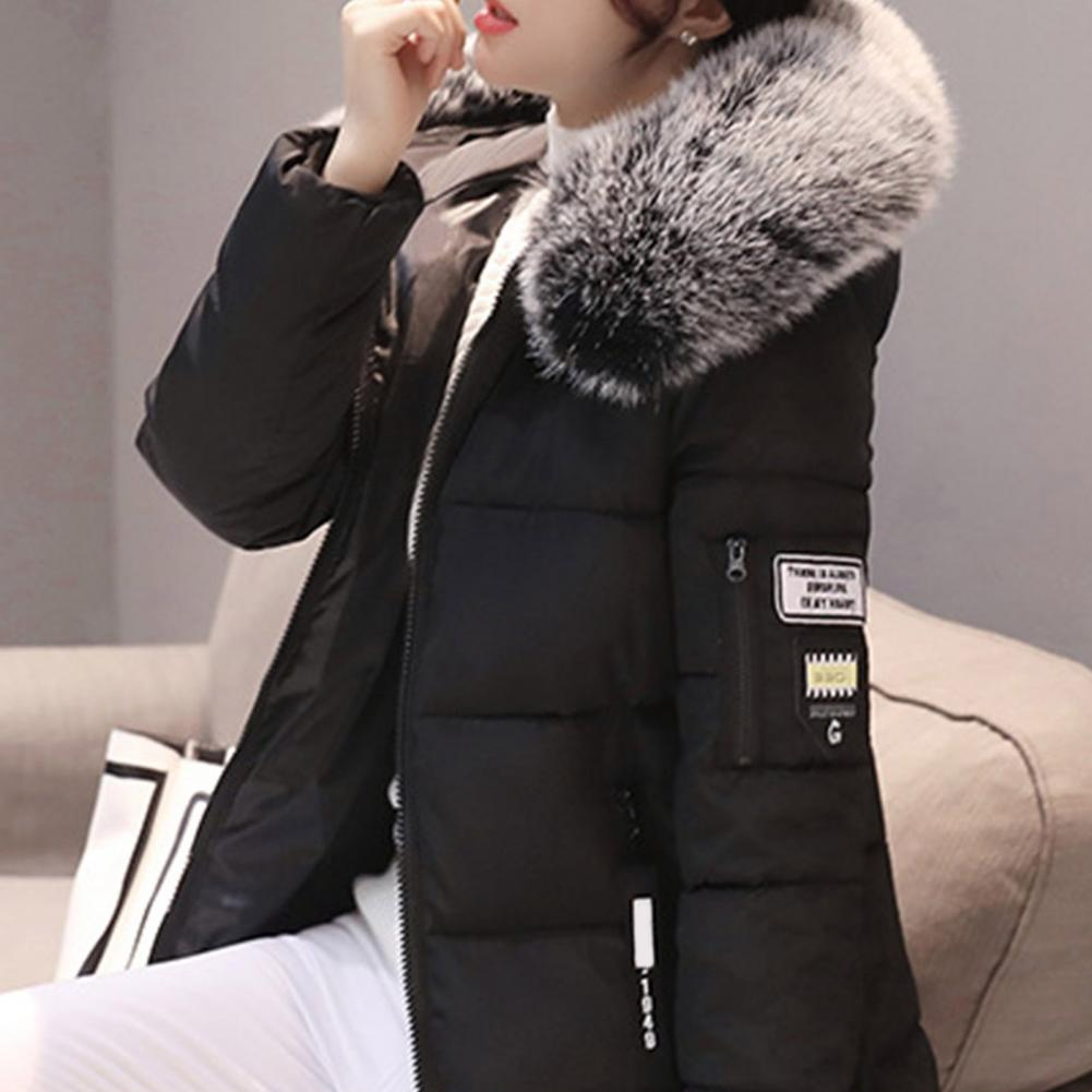 Elinora dames winterjas met praktische zakken en warme capuchon, perfecte winterkleding voor vrouwen.