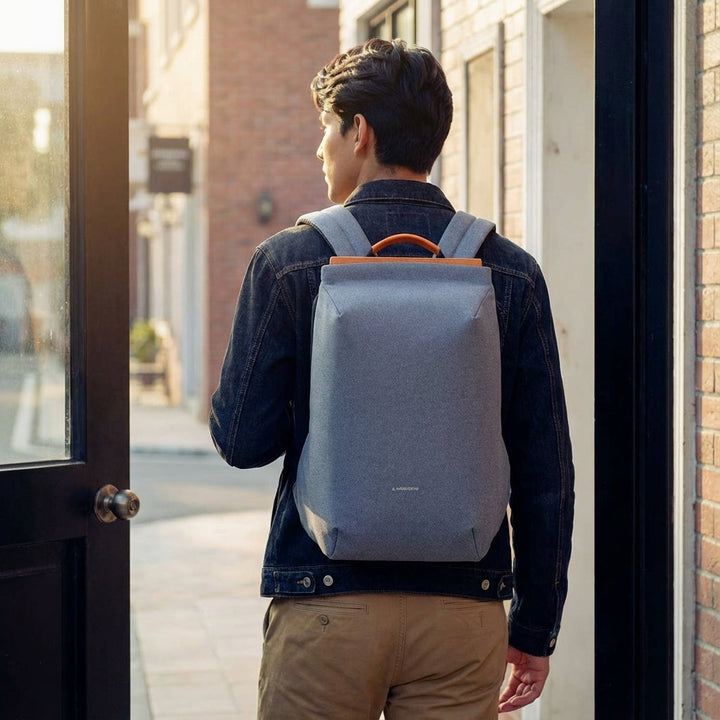 Compacte FlexPorter laptoprugzak 15 inch, stijlvol zwart design met antidiefstal, ideaal voor kantoor.
