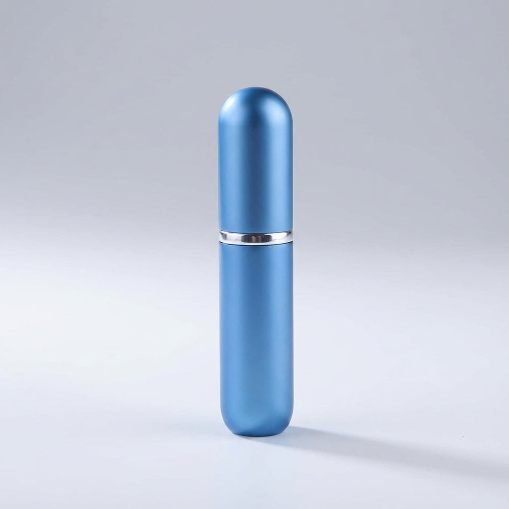 Draagbare parfumverstuiver PocketMist, perfect voor tas of zak. Neem je navulbare parfum overal mee naartoe.