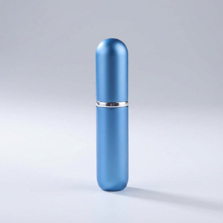 Draagbare parfumverstuiver PocketMist, perfect voor tas of zak. Neem je navulbare parfum overal mee naartoe.