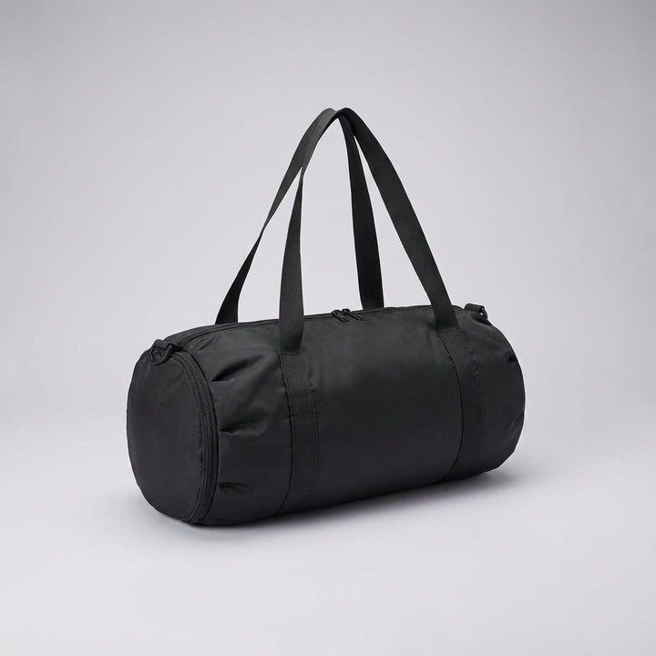 Stijlvolle waterafstotende opvouwbare reistas in duffelbag stijl, perfect voor dames & heren op reis of sport.