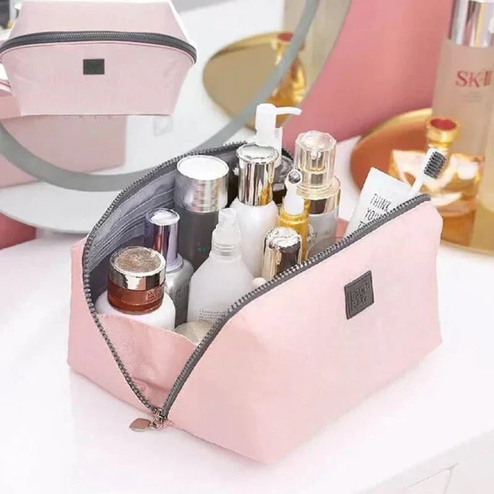 Slimme Packify reisorganizer voor toiletartikelen, make-up en meer; houdt alles netjes in je bagage.