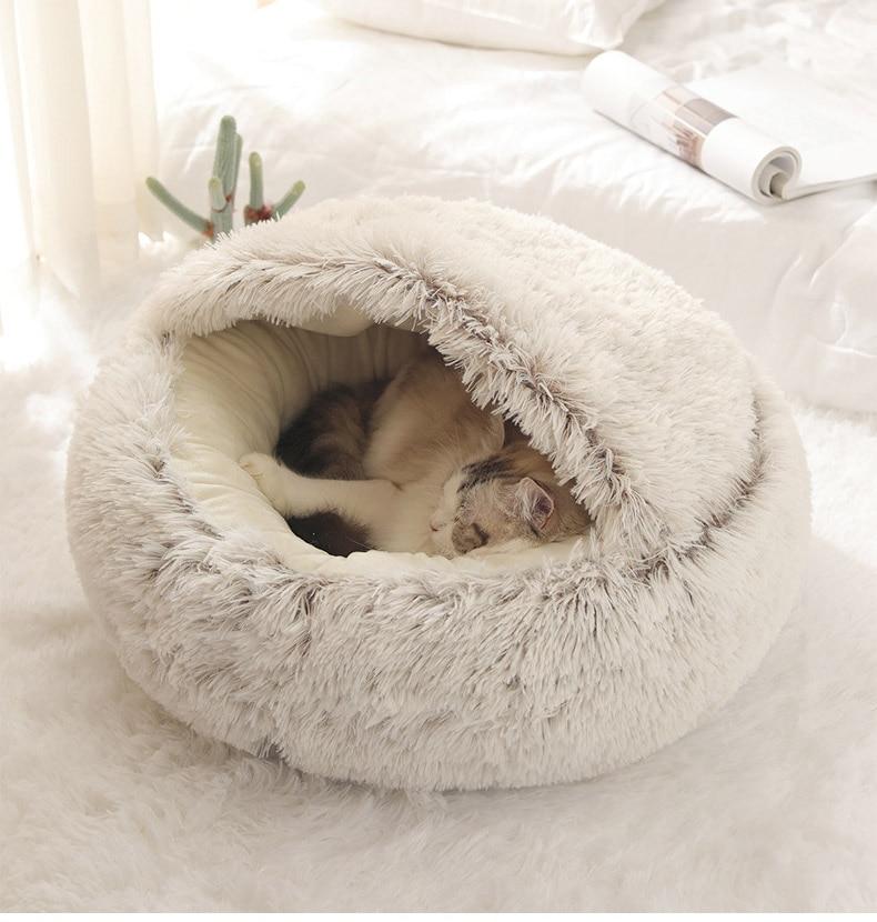Zachte pluche dierenmand, perfect als warme slaapplek voor katten en honden.